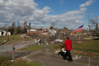 Dexter Humphries looks at destruction caused by Hurricane Michael from his driveway in Springfield, Florida, U.S., October 14, 2018. REUTERS/Terray Sylvester