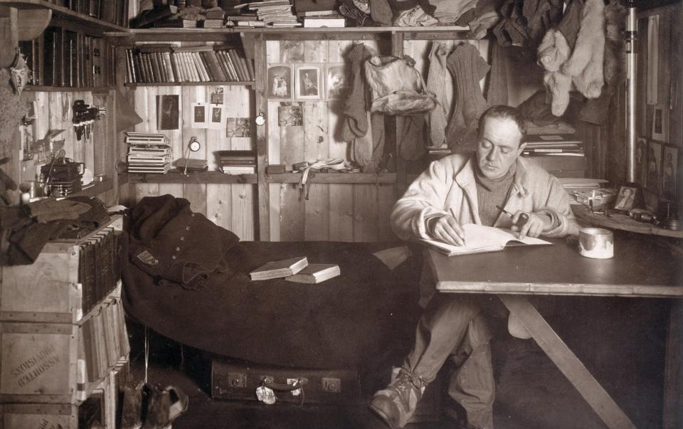 Robert Falcon Scott writing in his journal in Antarctica, 1910 - Royal Geographical Society 