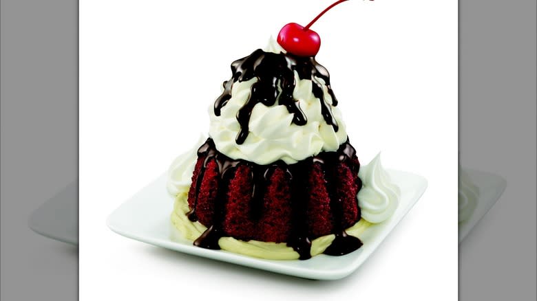 molten red velvet cake with whipped cream