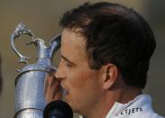 Zach Johnson of the U.S. celebrates as he kisses the Claret Jug after winning the British Open golf championship on the Old Course in St. Andrews, Scotland, July 20, 2015. REUTERS/Russell Cheyne