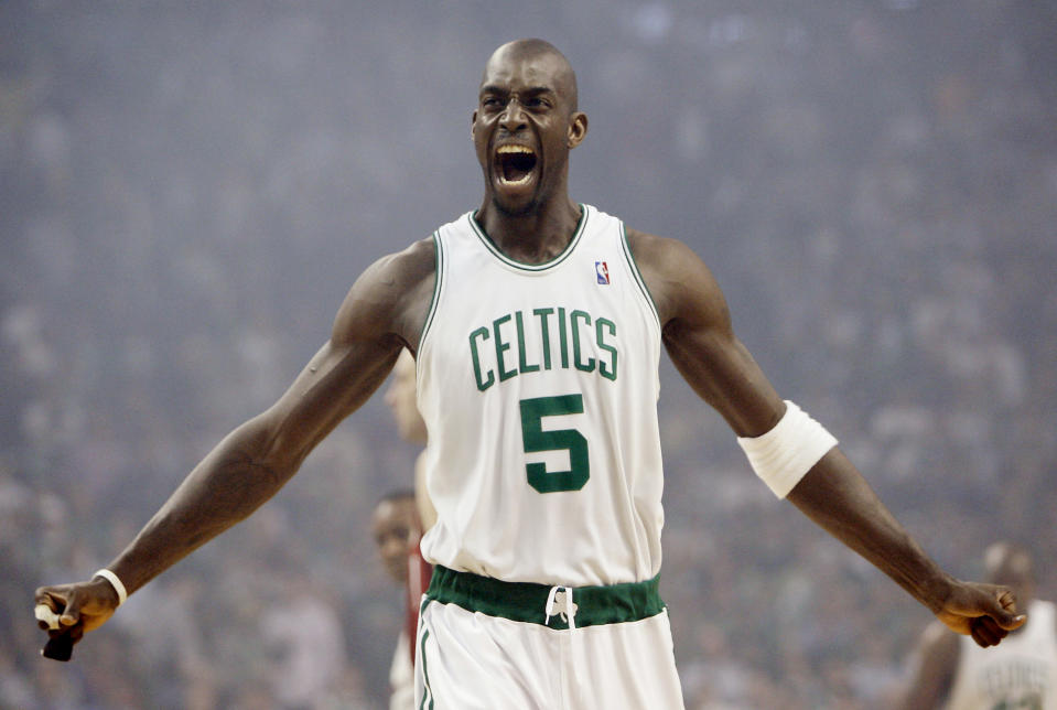 FILE - In this May 6, 2008, file photo, Boston Celtics' Kevin Garnett gestures to the crowd just before tipoff in Game 1 of an NBA Eastern Conference semifinal basketball series against the Cleveland Cavaliers in Boston. A person with knowledge of the decision tells The Associated Press that Kevin Garnett has informed the Minnesota Timberwolves that he will retire after 21 seasons. The two sides came to agreement on a buyout on Friday, Sept. 23, 2016, the person said. (AP Photo/Winslow Townson, File)