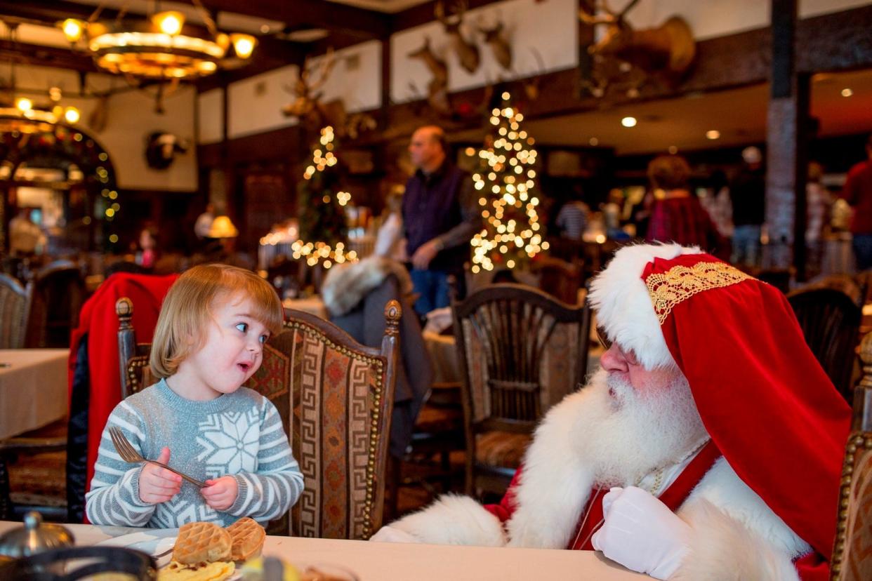 Santa visits with a youngster at Big Cedar Lodge.