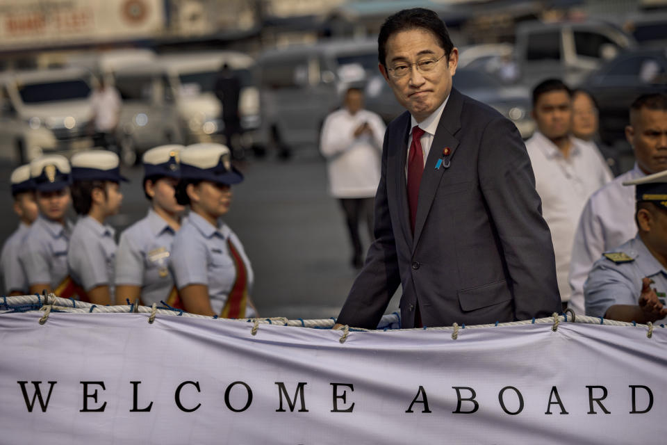 Japan's Prime Minister Fumio Kishida boards the BRP Teresa Magbanua ship at the Philippine Coast Guard headquarters on Saturday Nov. 4, 2023 in Manila, Philippines. (Ezra Acayan/Pool Photo via AP)