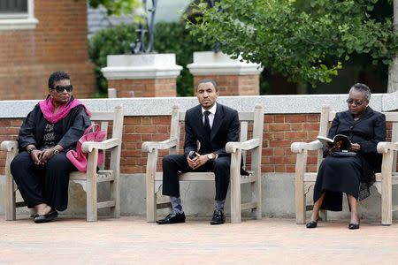 Mourners wait outside before the memorial service for Maya Angelou at Wake Forest University in Winston-Salem, North Carolina June 7, 2014. REUTERS/Nell Redmond