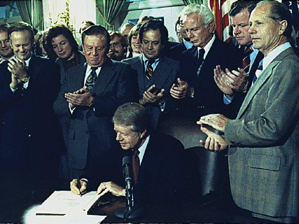 Jimmy Carter signing the Airline Deregulation Act of 1978