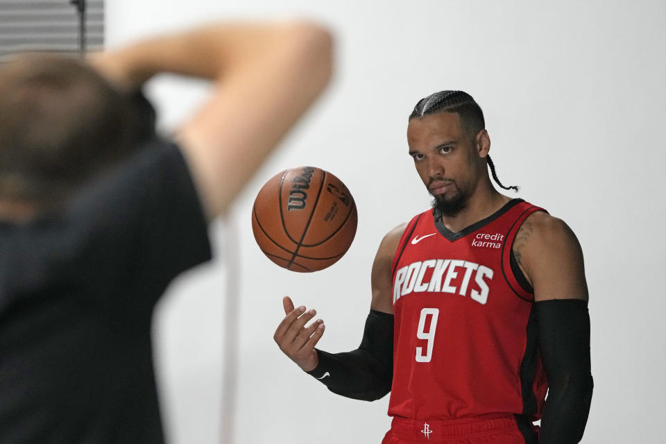 Houston Rockets' Dillon Brooks poses for a photographer during an NBA basketball media day Monday, Oct. 2, 2023, in Houston. (AP Photo/David J. Phillip)