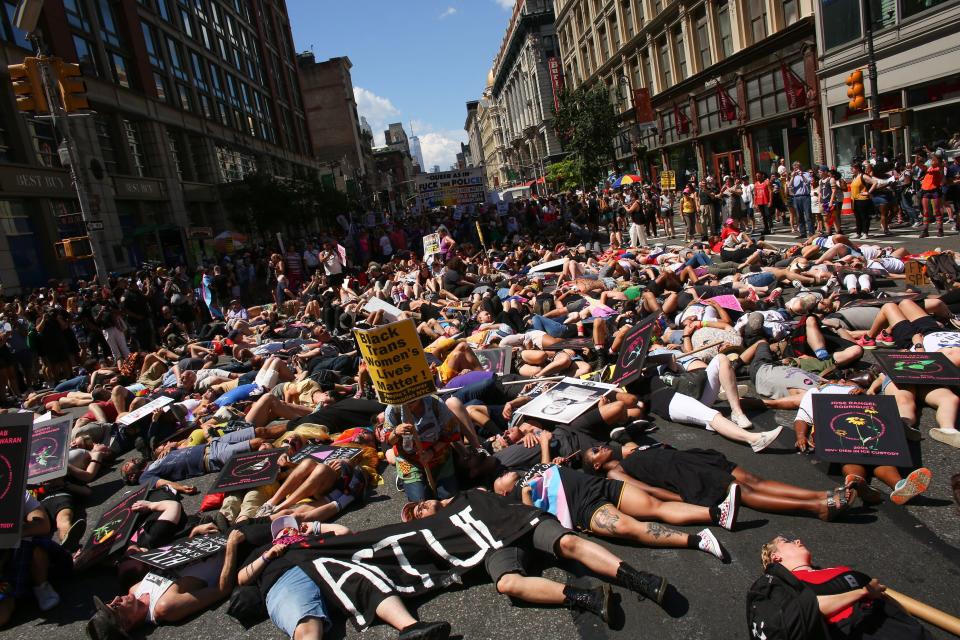 NEW YORK, NY - JUNE 30: Activists lie on Sixth Avenue during the Queer Liberation March on June 30, 2019 in New York City. The march marks the 50th anniversary of the Stonewall riots in the Greenwich Village neighborhood of Manhattan on June 28, 1969, widely considered a watershed moment in the modern gay-rights movement.