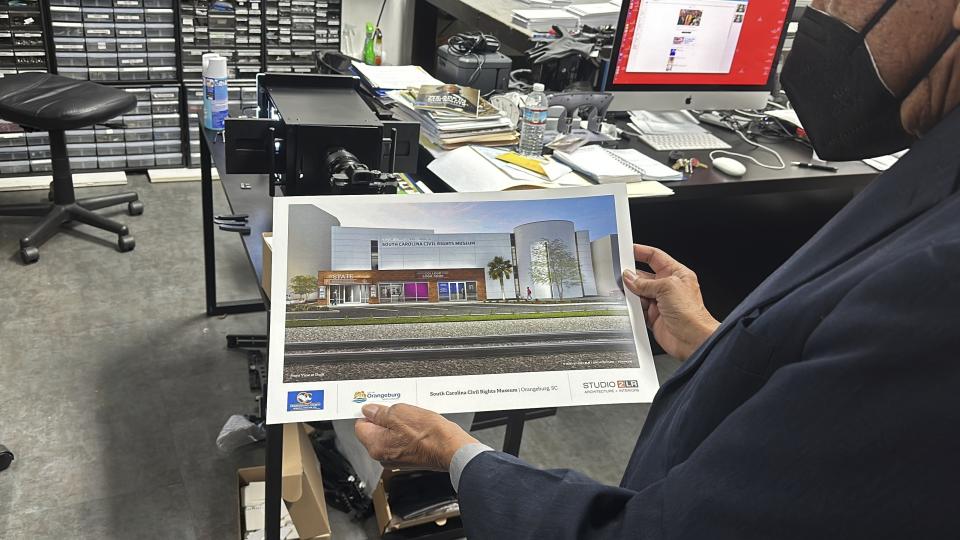A drawing of a planned new museum created by South Carolina civil rights photographer Cecil Williams, which would be the only civil rights museum in the state, is seen in Wiliams' office on Tuesday, Dec. 12, 2023, in Orangeburg, South Carolina. (AP Photo/Jeffrey Collins)