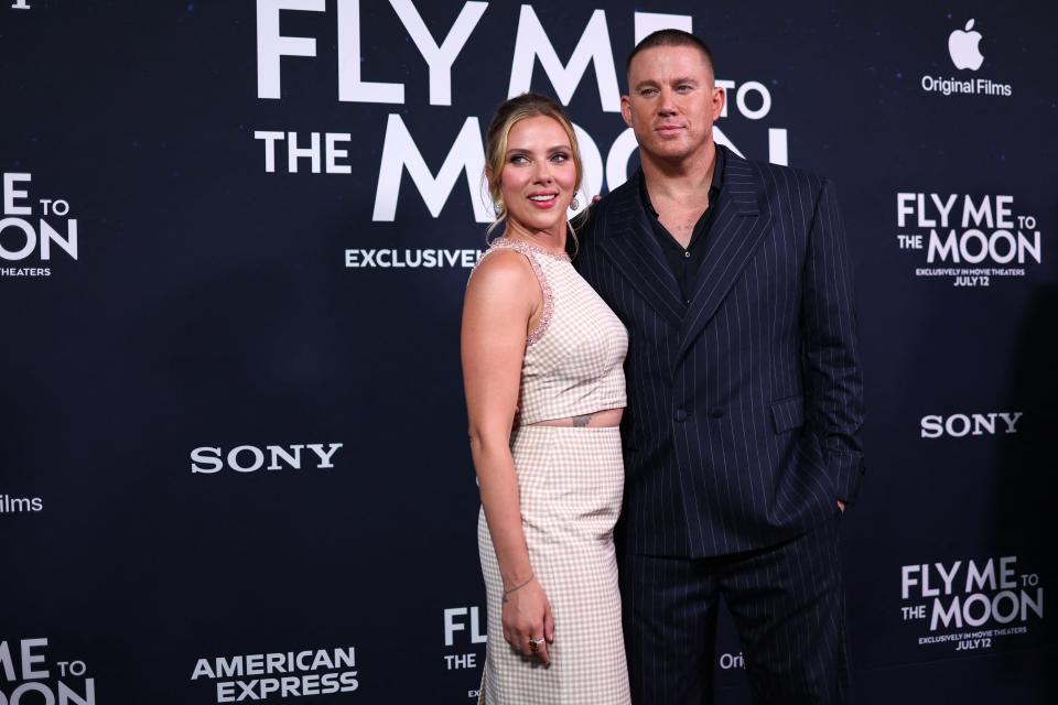 Scarlett Johansson, left, and Channing Tatum walk the red carpet at the New York premiere of "Fly Me to the Moon" on July 8.