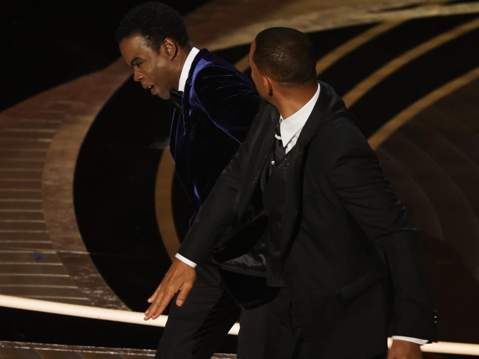 Will Smith appears to slap Chris Rock onstage during the 94th Annual Academy Awards at Dolby Theatre on March 27, 2022 in Hollywood, California.