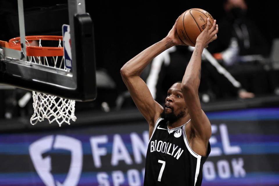 Brooklyn Nets forward Kevin Durant dunks against the Milwaukee Bucks during the second half of Game 1 of an NBA basketball second-round playoff series Saturday, June 5, 2021, in New York. (AP Photo/Adam Hunger)