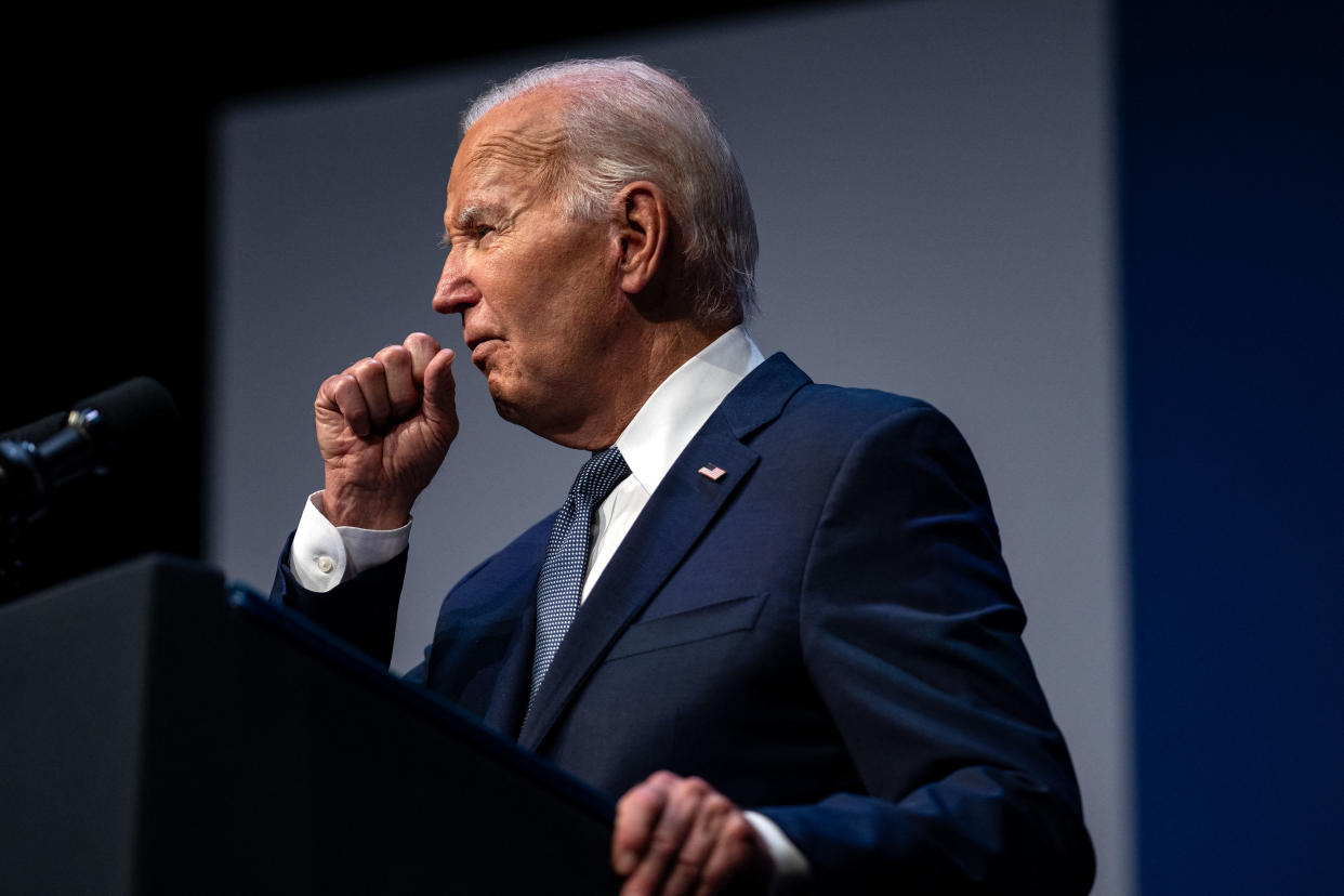 President Biden standing at a lectern.