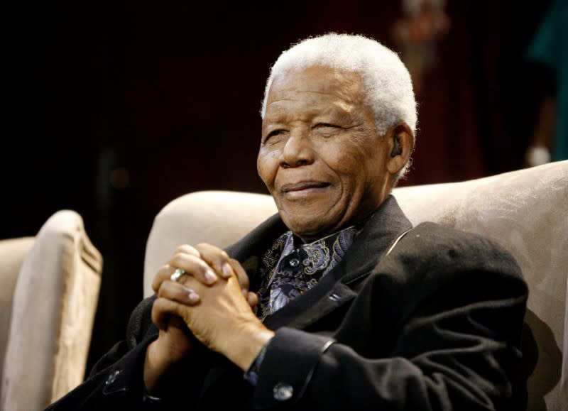 FILE PHOTO: Former South African President Mandela attends the Sixth Annual Nelson Mandela lecture in Kliptown