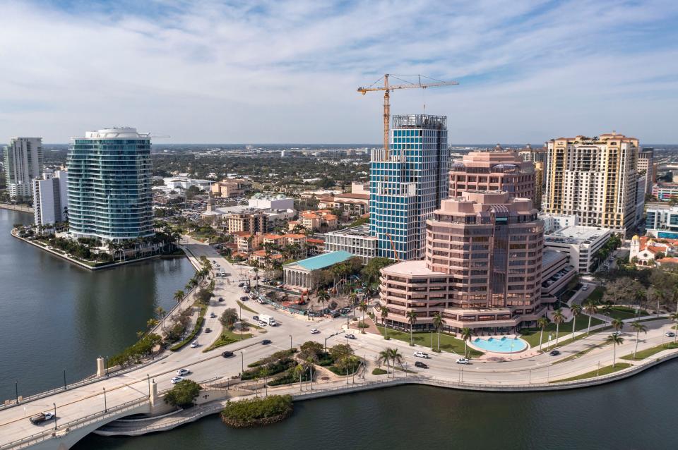 The One Flagler ultra-luxury office building, center with crane, is being constructed on February 1, 2024 in West Palm Beach, Florida.