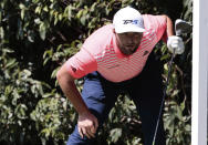 Jon Rahm of Spain follows his tee at the second hole during the third round for the WGC-Mexico Championship golf tournament, at the Chapultepec Golf Club in Mexico City, Saturday, Feb. 22, 2020.(AP Photo/Fernando Llano)