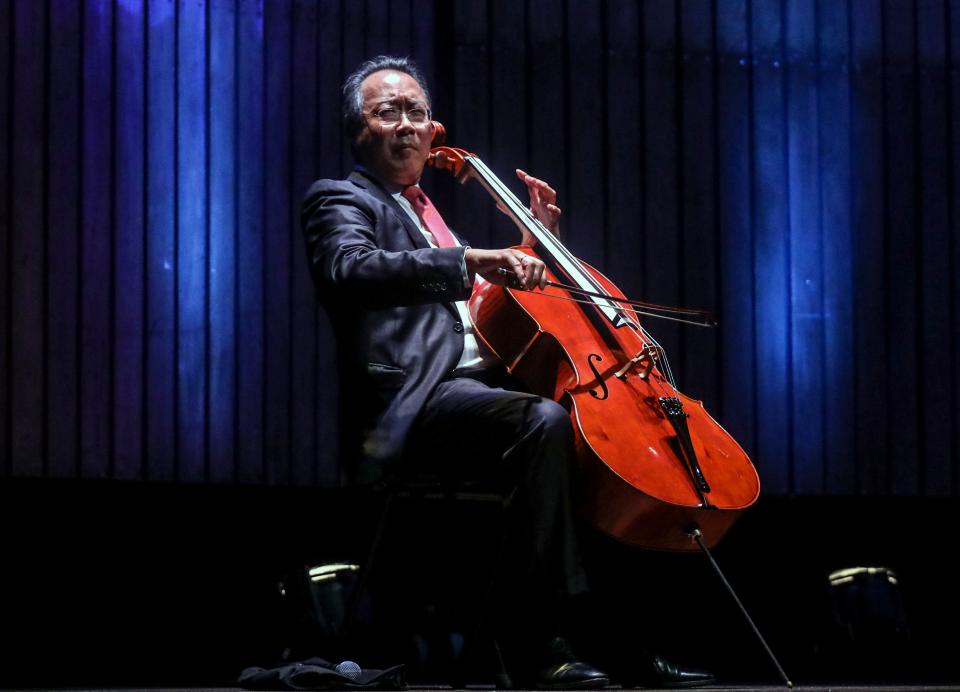 French-born Chinese-American cellist Yo-Yo Ma plays during a concert at the Metropolitan Theater in Medellin, Antioquia department, Colombia on May 9, 2019. (Photo by JOAQUIN SARMIENTO / AFP)        (Photo credit should read JOAQUIN SARMIENTO/AFP via Getty Images)