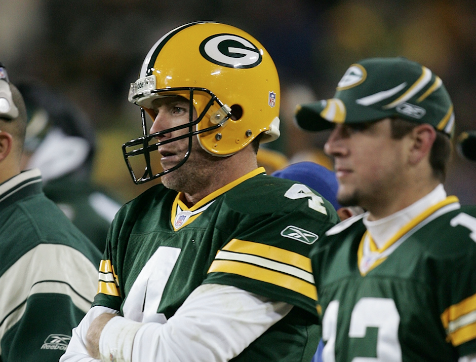 Brett Favre and Aaron Rodgers in their Green Bay days. (Getty)