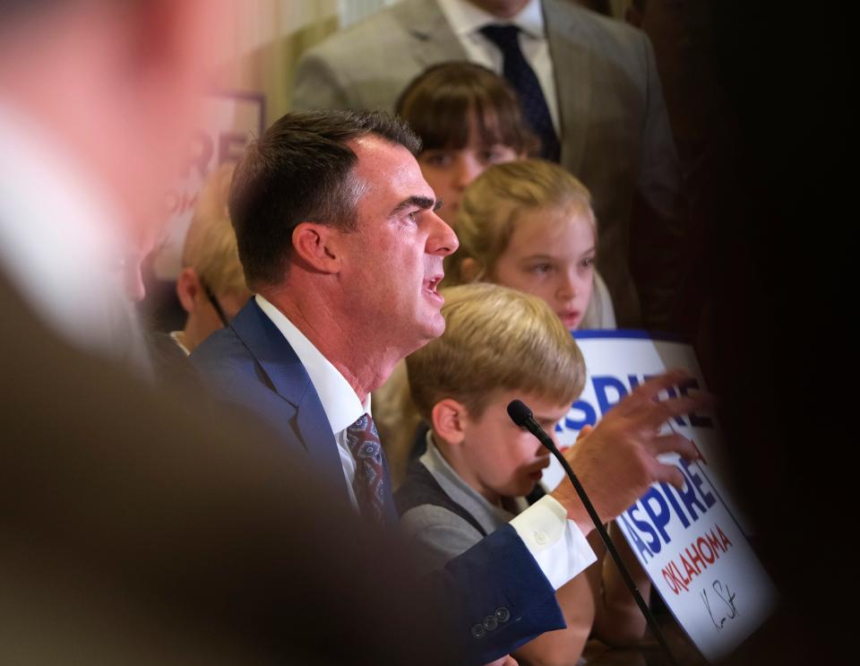 Oklahoma Gov. Kevin Stitt holds a signing ceremony for the Aspire Oklahoma Plan Thursday in the Blue Room at the state Capitol.