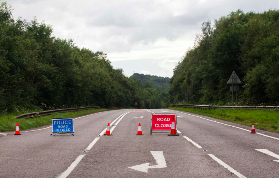 <em>Police closed the road after the fatal crash (SWNS)</em>