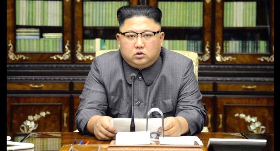 Kim Jong Un giving his statement