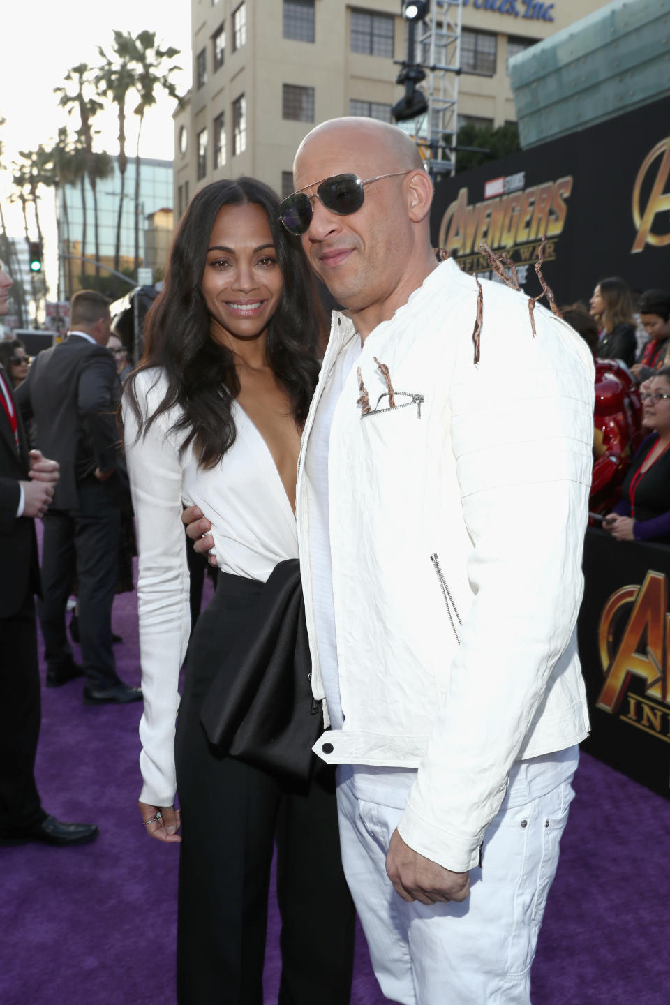 <p>Vin’s twiggy jacket was a nod to his <i>Guardians</i> character Groot — and he said cheese with Saldana, who is Gamora. (Photo: Getty Images) </p>