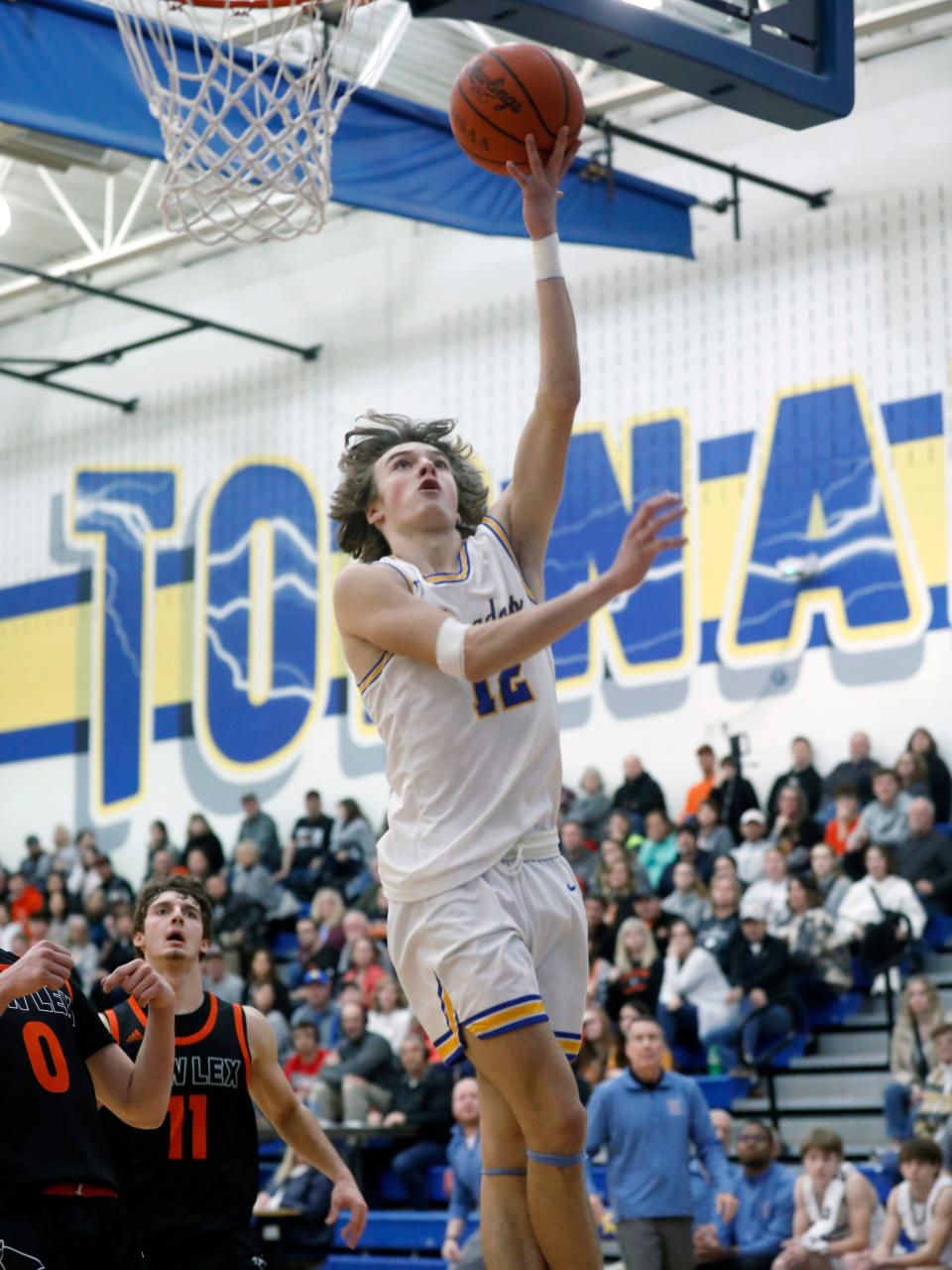 Jake Anton goes in for a layup during West Muskingum's 44-36 win against visiting New Lexington on Friday night at Gary Ankrum Gymnasium in Falls Township. The win secured the outright Muskingum Valley League-Small School division title for West, its first league title since 1991.