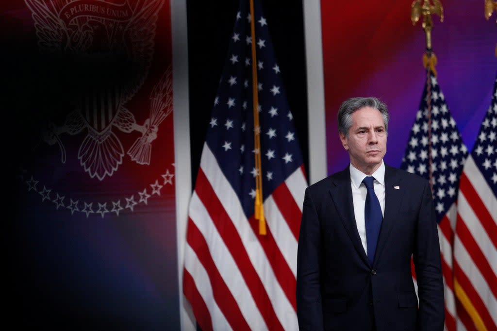 U.S. Secretary of State Antony Blinken stands by as U.S. President Joe Biden speaks about assistance the U.S. government is providing to Ukraine amid Russia's invasion of the neighboring country, during remarks in the Eisenhower Office Building's South Court Auditorium at the White House in Washington, U.S., March 16, 2022. REUTERS/Tom Brenner (REUTERS)