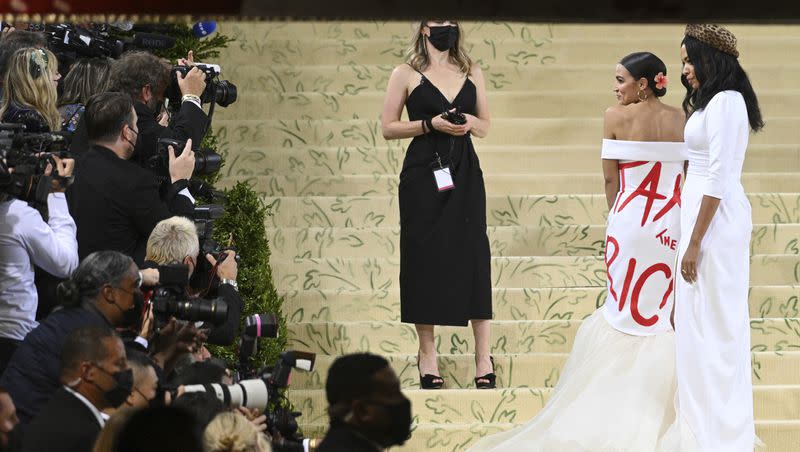 Rep. Alexandria Ocasio-Cortez, D-N.Y., wears a dress emblazoned with the words “Tax the Rich” at the 2021 Met Gala in New York, N.Y.