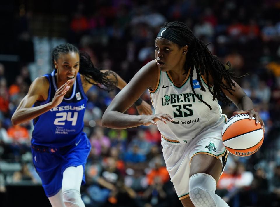 Oct 1, 2023; Uncasville, Connecticut, USA; New York Liberty forward Jonquel Jones (35) drives the ball against Connecticut Sun forward DeWanna Bonner (24) in the first half during game four of the 2023 WNBA Playoffs at Mohegan Sun Arena. Mandatory Credit: David Butler II-USA TODAY Sports ORG XMIT: IMAGN-727545 ORIG FILE ID: 20231001_db2_sv3_016.JPG