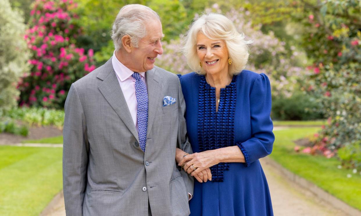 <span>A picture of King Charles and Queen Camilla in the Buckingham Palace garden released to mark the anniversary of their coronation on 6 May.</span><span>Photograph: Millie Pilkington/Buckingham Palace/PA</span>