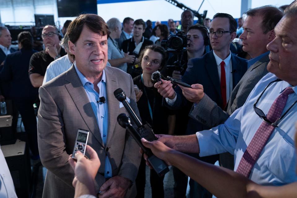 Ford President and CEO Jim Farley speaks to the media after he and DTE officials announce, during a press conference at Wayne Ford Michigan Assembly Plant Modification Center on Aug. 10, 2022,  a historical deal between the two entities where Ford will be powering all its Michigan factories with sustainable energy.