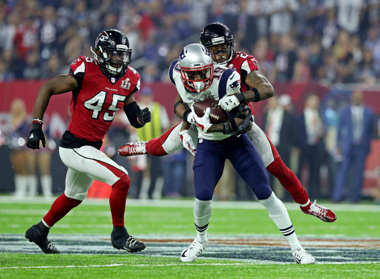 Feb 5, 2017; Houston, TX, USA; New England Patriots wide receiver Malcolm Mitchell (19) runs the ball against Atlanta Falcons cornerback Robert Alford (23) during the fourth quarter during Super Bowl LI at NRG Stadium. Mandatory Credit: Matthew Emmons-USA TODAY Sports