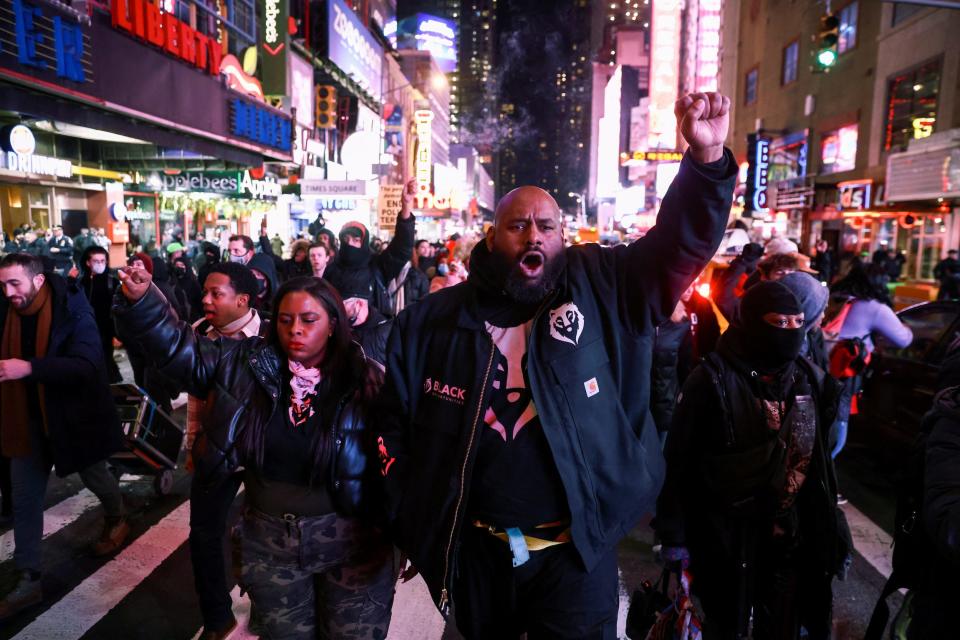 Protesters walk in the streets of New York City