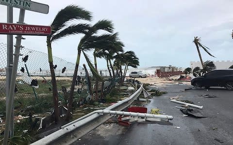 This Sept. 6, 2017 photo shows storm damage in the aftermath of Hurricane Irma, in St. Martin. Irma cut a path of devastation across the northern Caribbean, leaving thousands homeless after destroying buildings and uprooting trees - Credit: Jonathan Falwell via AP