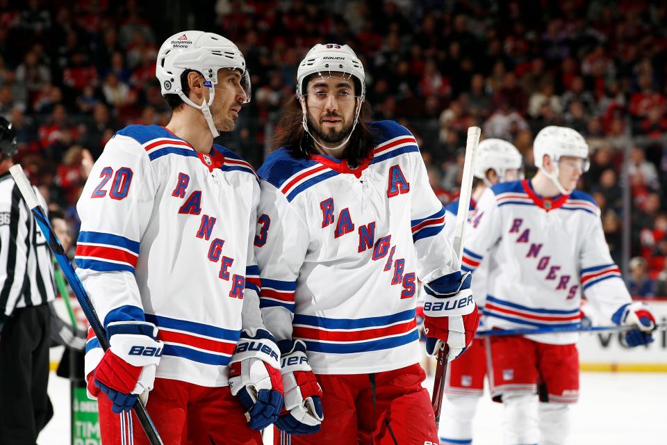 NEWARK, NEW JERSEY - FEBRUARY 22: Mika Zibanejad #93 talks with Chris Kreider #20 of the New York Rangers during the first period against the New Jersey Devils at Prudential Center on February 22, 2024 in Newark, New Jersey.