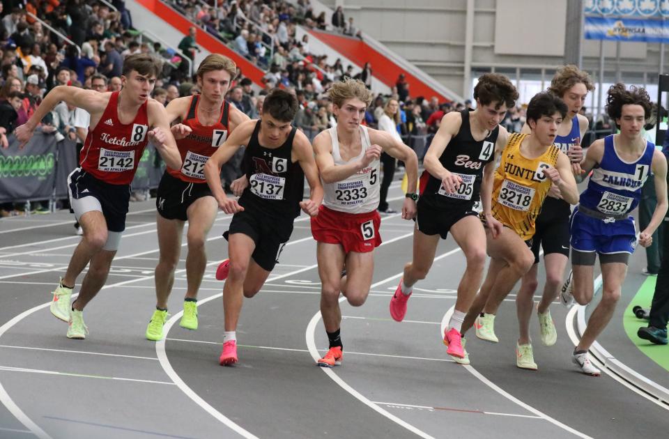 (L-R): Connor Hitt of Ketcham, Sam Young of Mamaroneck and Matt Schutzbank of Nyack with others at start of boys 1600 meter run during the New York State Indoor Track and Field Championships, at the Ocean Breeze Athletic Complex on Staten Island, March 4, 2023.