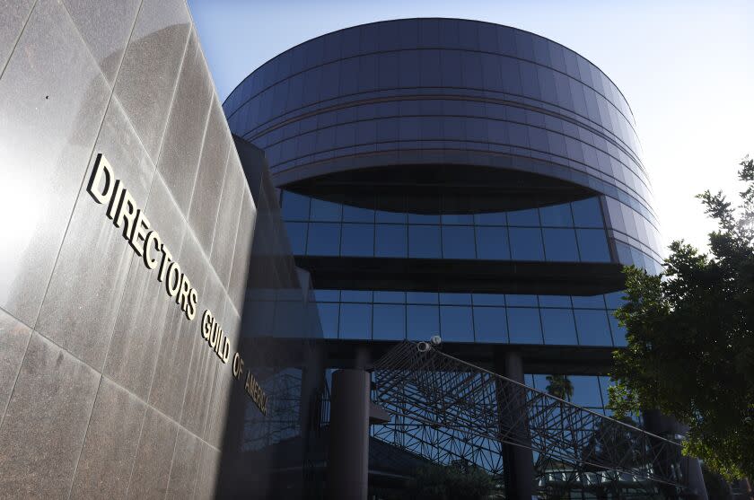 The Directors Guild of America headquarters is pictured on April 16, 2020, in Los Angeles. Hollywood's unions announced Monday, Sept. 21, 2020, that they have reached an agreement on pandemic protocols with major studios that will allow the broad resumption of production of films and television after six months of empty sets and widespread unemployment. The Directors Guild of America, the International Alliance of Theatrical Stage Employees, the International Brotherhood of Teamsters, the Basic Crafts unions and the Screen Actors Guild-American Federation of Television and Radio Artists jointly announced the deal reached with the Alliance of Motion Picture and Television Producers after months of planning and negotiating. (AP Photo/Chris Pizzello, File)