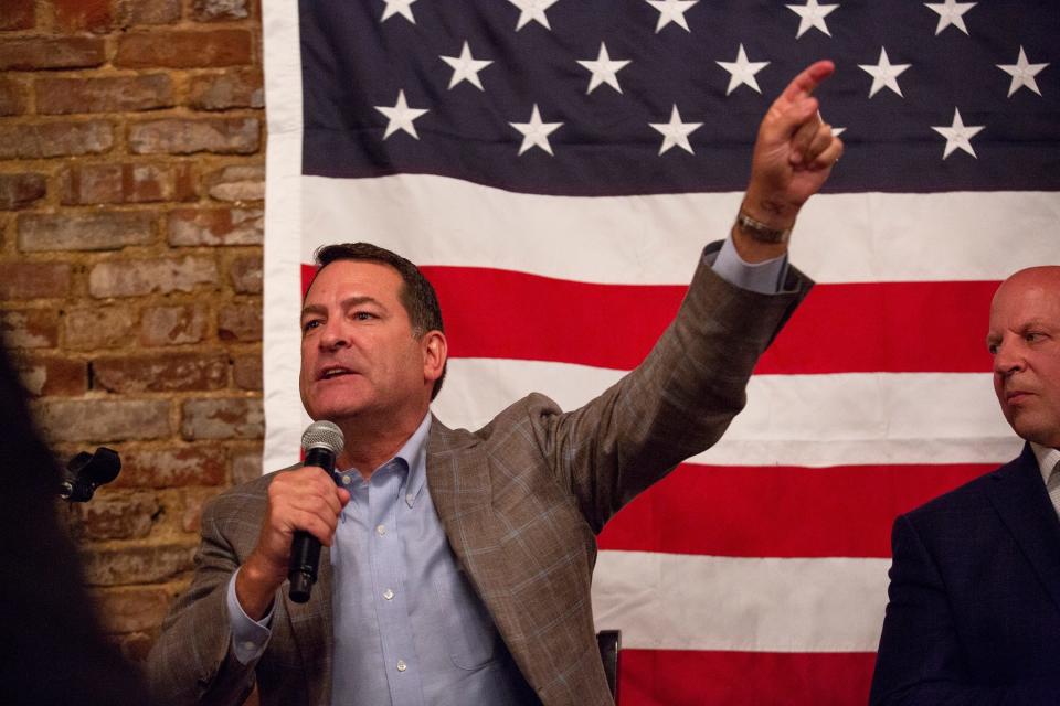 Congressmen Mark Green, left, and Congressman Scott DesJarlais, right, attend  a Reagan Day fundraising event for the Maury County Republican Party in Columbia on Thursday, Oct. 3, 2019.