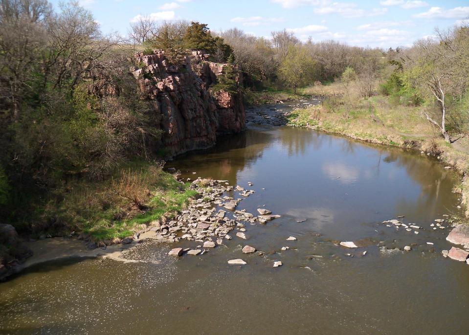 This May 2014 photo shows Split Rock Creek in Palisades State Park, South Dakota. The state’s Division of Parks and Recreation says camping reservations are up this year, partly because of a yearning to be outdoors after the brutal winter. (AP Photo/Joe Kafka)