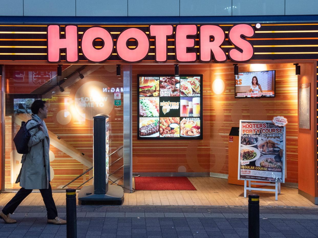 Outside of a Hooters restaurant.