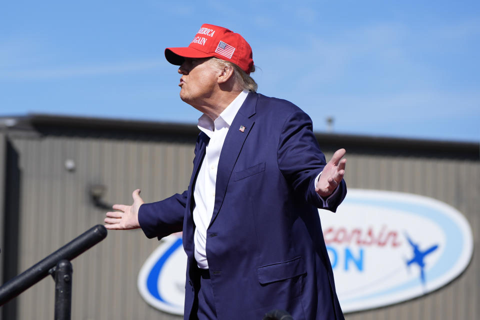 Republican presidential nominee former President Donald Trump gestures as he departs a campaign event at Central Wisconsin Airport, Saturday, Sept. 7, 2024, in Mosinee, Wis. (AP Photo/Alex Brandon)