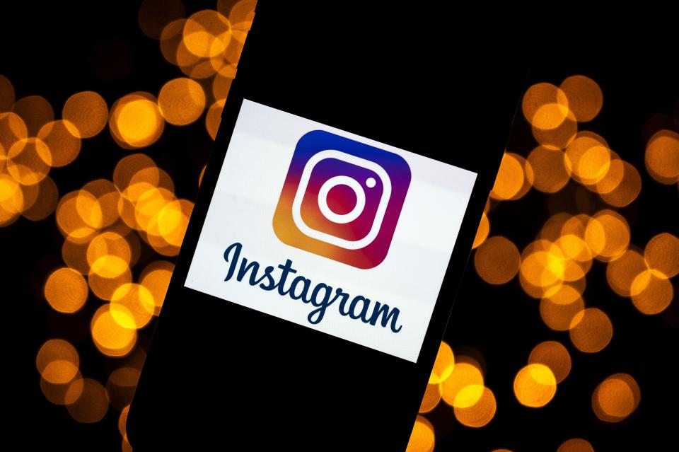 This picture taken on September 28, 2020 shows the logo of the social network Instagram on a smartphone, in Toulouse, southwestern France. - The Instagram group will, in early October 2020, celebrate its ten-year anniversary. (Photo by Lionel BONAVENTURE / AFP) (Photo by LIONEL BONAVENTURE/AFP via Getty Images)