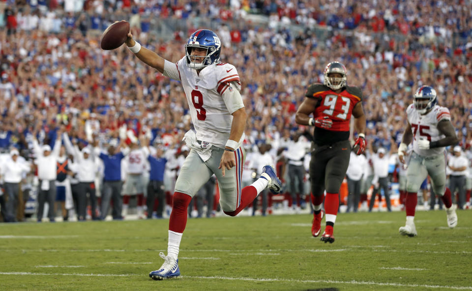 New York Giants quarterback Daniel Jones (8) scores on a 7-yard touchdown run against the Tampa Bay Buccaneers during the second half of an NFL football game Sunday, Sept. 22, 2019, in Tampa, Fla. (AP Photo/Mark LoMoglio)
