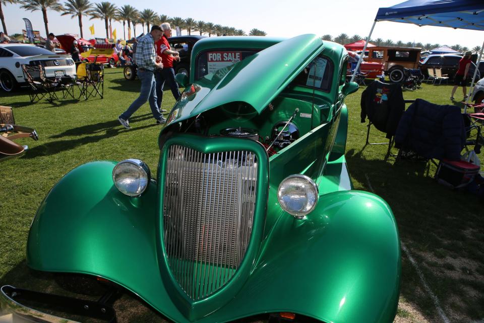 Car enthusiasts attend the 18th Annual Dr. George Charity Car Show at the Indian Wells Tennis Garden in Indian Wells, Calif., on Saturday, February 8, 2020. Palm Springs Cruisin' Association hosted the event which showcased muscle cars, classics, street rods and more. 