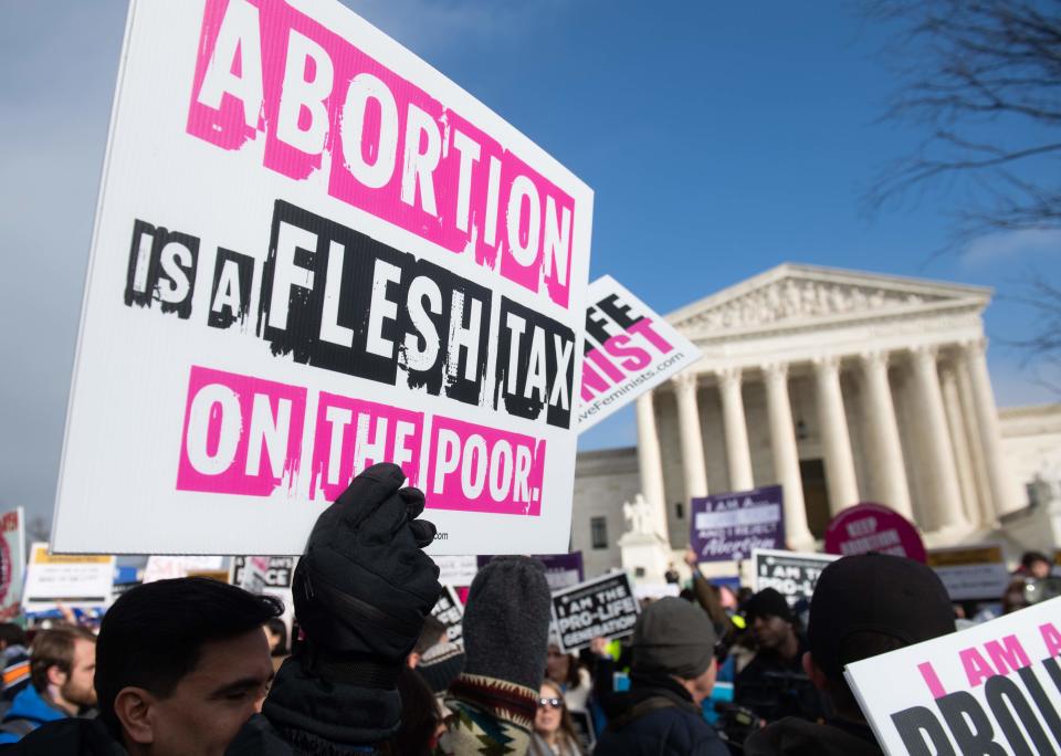 Anti-abortion activists participate in the "March for Life," an annual event to mark the anniversary of the 1973 Supreme Court case Roe v. Wade, in front of the US Supreme Court, on January 18, 2019.