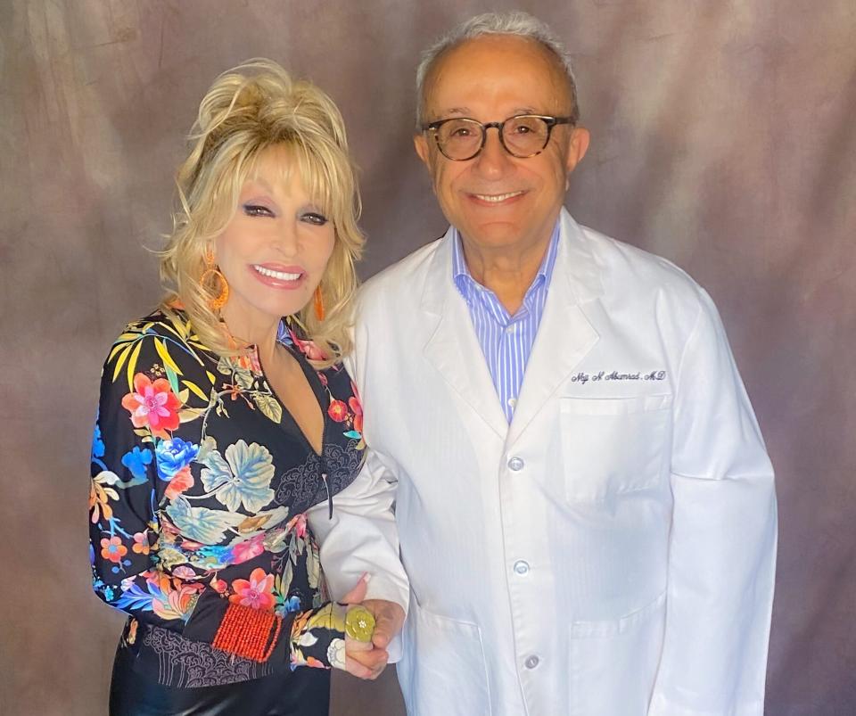 Dolly Parton and Naji Abumrad, MD pose as her latest gift to Vanderbilt is announced 06/15/2022