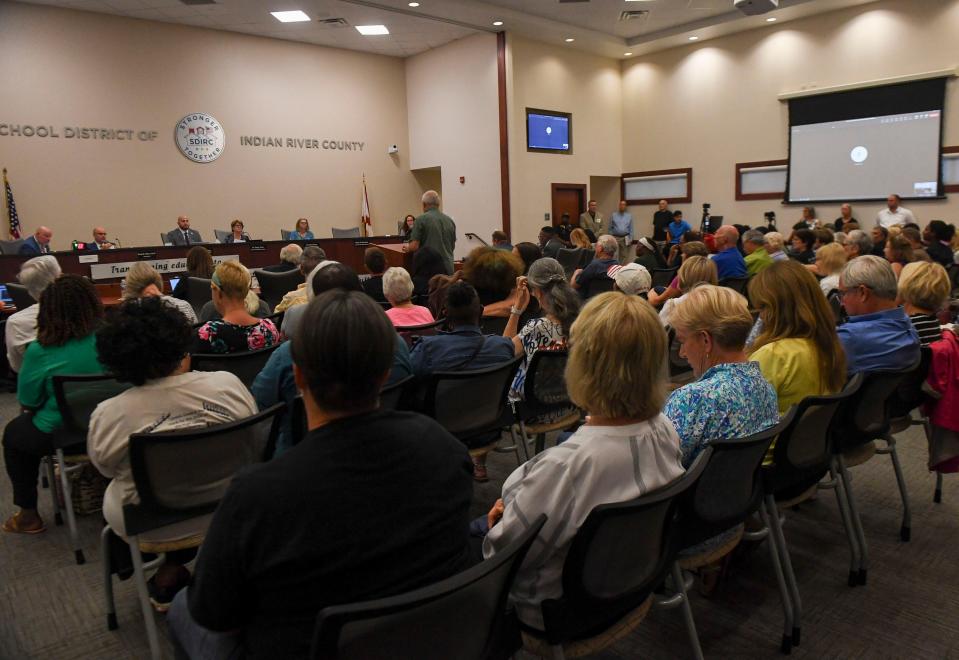 People gather for a school board meeting, Monday, Aug. 28, 2023, in Indian River County. The public meeting, which ended after 11 p.m., heard from some community members concerned about sexually explicit language within the district's school library books and Gov. Ron DeSantis’ education curriculum based on the approach that “slaves benefitted from slavery.” Over 50 people participated in the citizen input part of the meeting, with people for and against the issues in the discussion, that at times, got heated, leading to a couple of people being escorted out of the meeting.