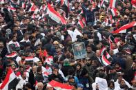 Supporters of Iraqi Shi'ite cleric Moqtada al-Sadr protest against what they say is U.S. presence and violations in Iraq, during a demonstration in Baghdad