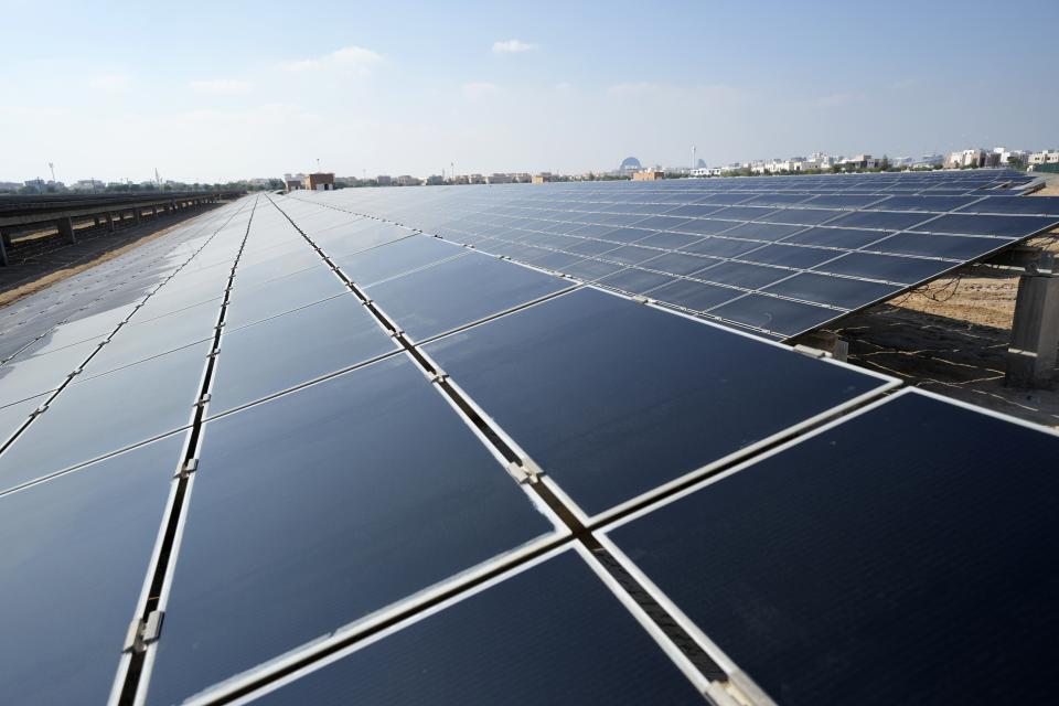 Solar panels sit at Masdar City near Abu Dhabi, United Arab Emirates, as Dubai hosts the COP28 U.N. Climate Summit, Friday, Dec. 8, 2023. (AP Photo/Kamran Jebreili)