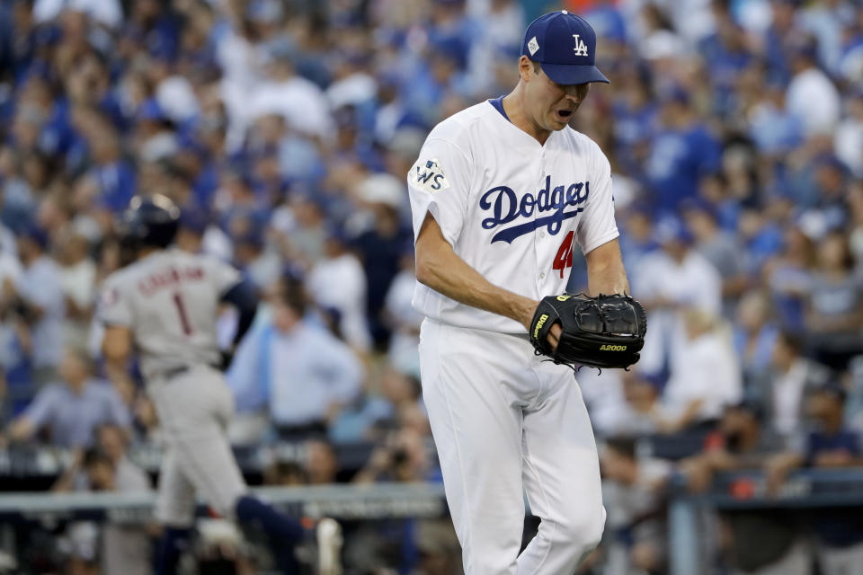 <p>Los Angeles Dodgers starting pitcher Rich Hill celebrates after the last out in the top of the first inning of Game 2 of baseball’s World Series against the Houston Astros Wednesday, Oct. 25, 2017, in Los Angeles. (AP Photo/Matt Slocum) </p>